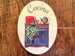 Placa de cocina con mueble y lata de té (con texto COCINA)