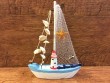 Barco con conchas de 22 cm. modelo aleatorio