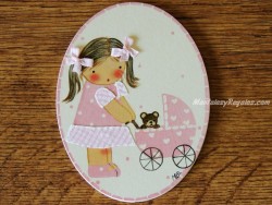 Placa infantil para puerta modelo niña con cochecito de bebé rosa